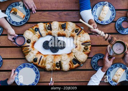 Rosca de reyes or Epiphany cake, Roscon de reyes with traditional mexican chocolate cup Stock Photo