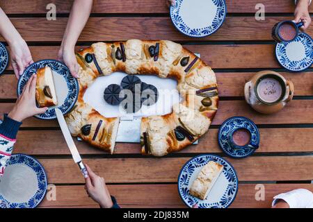 Rosca de reyes or Epiphany cake, Roscon de reyes with traditional mexican chocolate cup Stock Photo