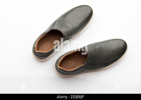 Top View of Pair of Dark Blue Slip on Shoes Isolated on White  Background Stock Photo