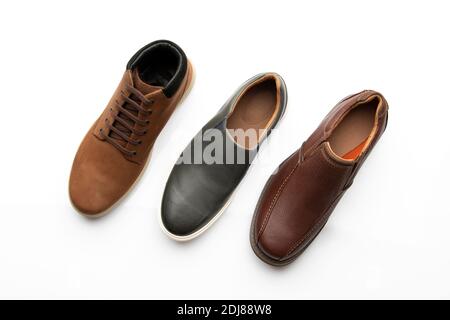 Top View of Various Shoes Isolated on White  Background Stock Photo