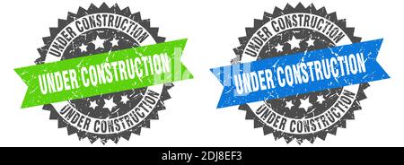 under construction grunge stamp set. under construction band sign Stock Vector