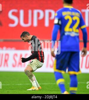 Milan, Italy. 13th Dec, 2020. AC Milan's Theo Hernandez (L) celebrates during a Serie A football match between AC Milan and Parma in Milan, Italy, Dec. 13, 2020. Credit: Daniele Mascolo/Xinhua/Alamy Live News Stock Photo