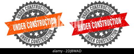 under construction grunge stamp set. under construction band sign Stock Vector