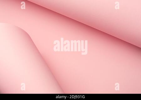 Pastel pink curved paper abstract background. Creative frame, copy space. Stock Photo