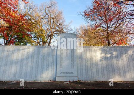 Frederick, MD, USA 11-22-2020: A granite Killed in Action monument in Memorial Park of Frederick listing all the local soldiers who gave their lives d Stock Photo