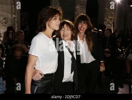 Lou Doillon and Charlotte Gainsbourg attending the Saint Laurent show ...