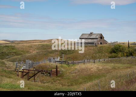 A 1930's Barn On A Summer Prairie Landscape Near Cardston, Alberta, Canada Stock Photo