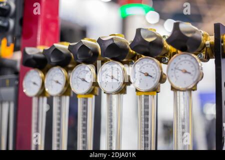 Flowmeter, rotameter - flow regulator for cooling system of injection machine Stock Photo