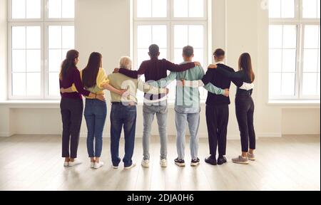 Team of community members and friends supporting each other and facing future with hope Stock Photo