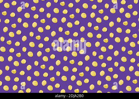 background made from Potato chips on purple background flat lay. potato snack chips isolated Fast food banner. Stock Photo