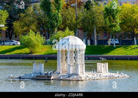 Astrakhan, Russia. The ancient pond with the name Swan Lake in center of city. Stock Photo