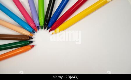 Different colors of markers on white background. Craft work design Stock Photo