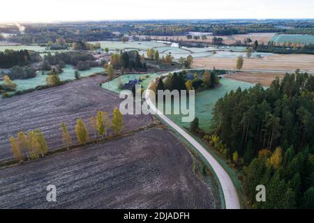 An aerial of a mosaic Estonian countryside landscape with small fields and forests. Stock Photo