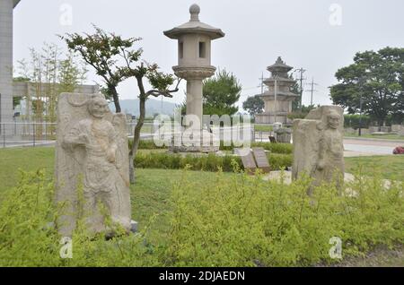 Stone guardians and stone lantern from the courtyard of the Gyeongju National Museum, South Korea Stock Photo