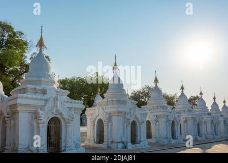 White stupas of Kuthodaw Pagoda in Mandalay, Burma Myanmar Stock Photo