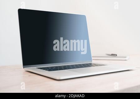 side view. open laptop on the desktop. Stock Photo