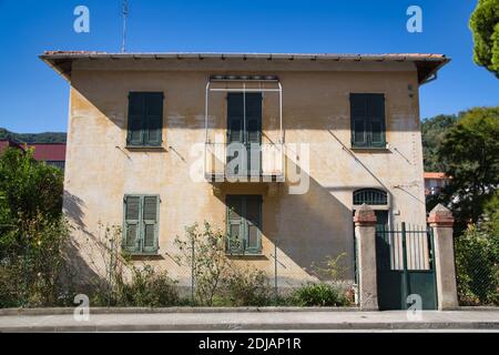 old house with closed blinds Stock Photo