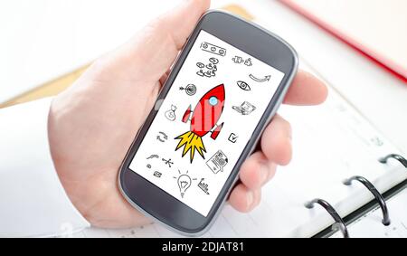 Start up concept shown on a smartphone screen Stock Photo