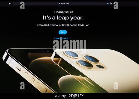 New york, USA - December 14, 2020: New apple iphone 12 pro on laptop screen macro close up view Stock Photo