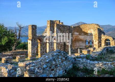 The 10 century ruines of Saint Achilleios Basilica on the island of Agios Achilleios on Mikri Prespa lake, Macedonia, Northern Greece. Stock Photo