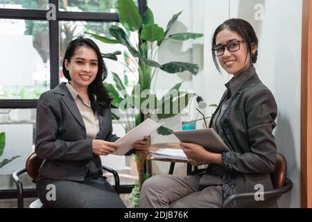 Young asian business woman meeting in a cafe Stock Photo