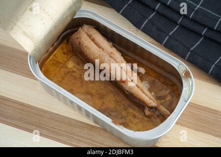 Sardine fillet with olive oil in a open tin can. Close up. Stock Photo