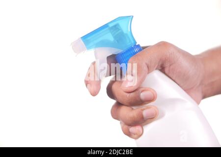 hand holding spray bottle isolated in white  Stock Photo