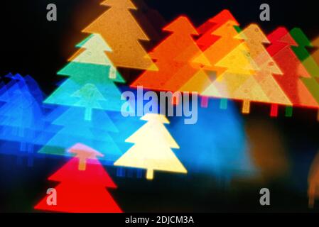 Graphic abstract patterns of Christmas trees against a black background Stock Photo