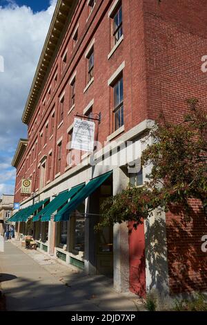 A few of some of the historic brick buildings along Church street, now a commerical, shopping area. In Belfast, Maine. Stock Photo