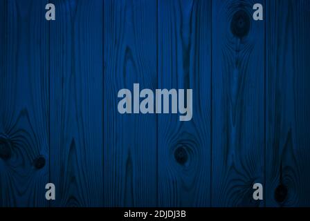 The dark blue surface of the pine boards. Natural background for design. Stock Photo