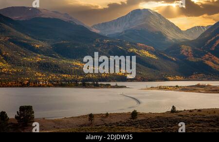 Sun setting over the Rocky Mountains in Twin Lakes, Colorado Stock Photo