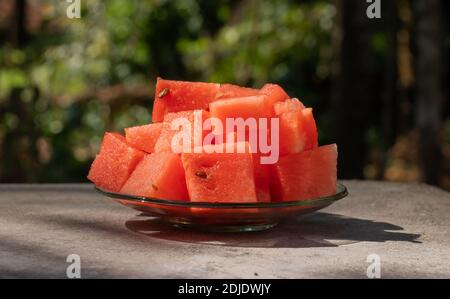 watermelon cut in to pieces, in a plate Stock Photo