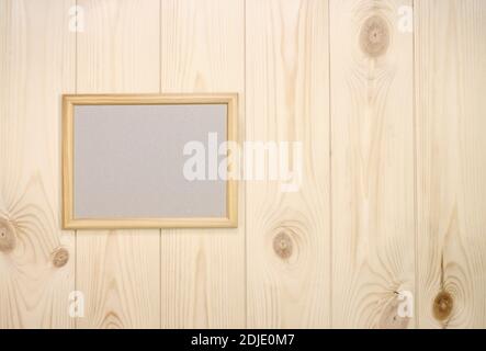 Mock up empty wood frame on light pine wood wall background, show text or product. Stock Photo