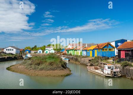 Oléron Island, Charente-Maritime, France. 25 April 2015 - Oyster farming huts in small harbour at Chateau d'Oléron on western Atlantic coast France Stock Photo