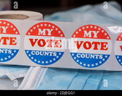 My Vote counts sticker on protective face mask as concept for counting all legal votes in presidential election in the USA Stock Photo