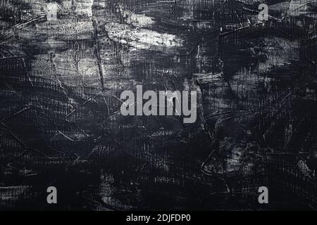 Black concrete wall. Texture old dark stone background. Vintage anthracite wallpaper. Old scratched dark grunge plaster texture. Black cement Stock Photo