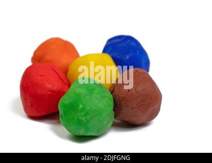Colorful plasticine against a white background Stock Photo