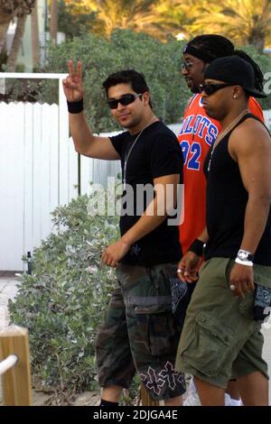 Wilmer Valderrama and his posse strutt the boardwalk on Miami Beach