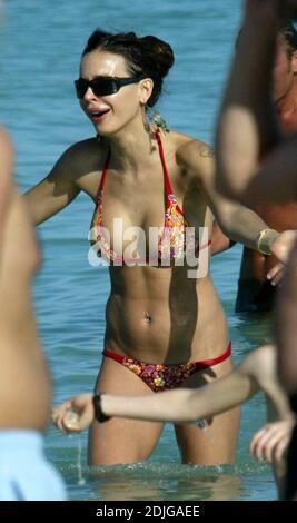 Exclusive!! Italian beauty Nina Moric spends a day on Miami Beach with partner Fabrizzio Corona, her mother and her son. Stock Photo