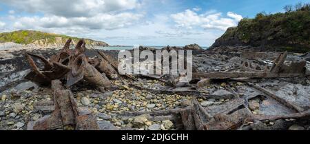 Old shipwreck  at Polridmouth Bay, Near Fowey, Cornwall, UK Stock Photo