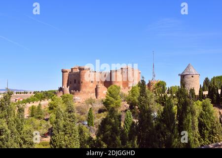 Belmonte Castle and windmill surrounded by trees. Stock Photo