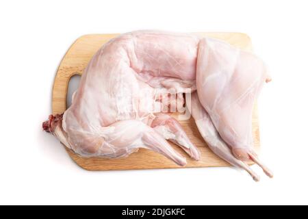 Whole raw rabbit isolated on a white background. Top view, flat lay, close up. Stock Photo