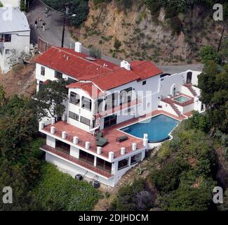 Exclusive!! This is the $4.3 million Hollywood Hills home that Irish actor and Hollywood bad boy Colin Farrell has reportedly just purchased. This will be the first home he has splashed out on for himself in Hollywood to be near his 2 1/2 year old son James (Farrell previously bought James's mother model Kim Bordenave a home in LA where she is based). Farrell was obviously taken with the neighborhood after having stayed frequenly at the nearby Chateau Marmont hotel on many of his LA visits. The four bedroom, 4 1/2 bath Spanish Style Villa is perched high above the Sunset Strip and is 6,950 sq Stock Photo