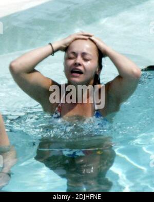 Exclusive!! Christina Ricci spends an afternoon poolside at a Miami Beach hotel. The actress spent the day with five girlfriends, drank, smoked, swam, clowned around and chatted to handsome pool attendants.  5/12/05 Stock Photo