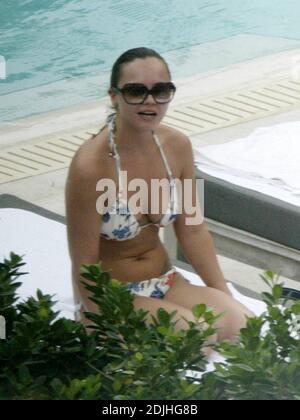 Exclusive!! Christina Ricci spends an afternoon poolside at a Miami Beach hotel. The actress spent the day with five girlfriends, drank, smoked, swam, clowned around and chatted to handsome pool attendants.  5/12/05 Stock Photo