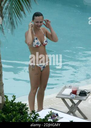 Exclusive!! Christina Ricci spends an afternoon poolside at a Miami Beach hotel. The actress spent the day with five girlfriends, drank, smoked, swam, clowned around and chatted to handsome pool attendants.  5/12/05 Stock Photo