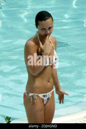 Exclusive!! Christina Ricci spends an afternoon poolside at a Miami Beach hotel. The actress spent the day with five girlfriends, drank, smoked, swam, clowned around and chatted to handsome pool attendants.  5/12/05 Stock Photo