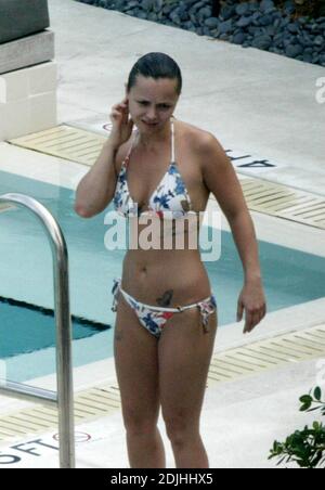 Exclusive!! Christina Ricci spends an afternoon poolside at a Miami Beach hotel. The actress spent the day with five girlfriends, drank, smoked, swam, clowned around and chatted to handsome pool attendants.  5/12/05 Stock Photo