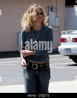 Exclusive!! Actress Meg Ryan checked that her zipper wasn't flying low  during a recently shopping trip in Santa Monica, Ca. 4/11/05 Stock Photo