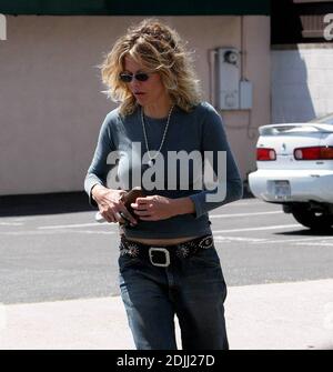 Exclusive!! Actress Meg Ryan checked that her zipper wasn't flying low  during a recently shopping trip in Santa Monica, Ca. 4/11/05 Stock Photo